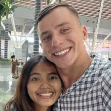 A man and woman are smiling for the camera.